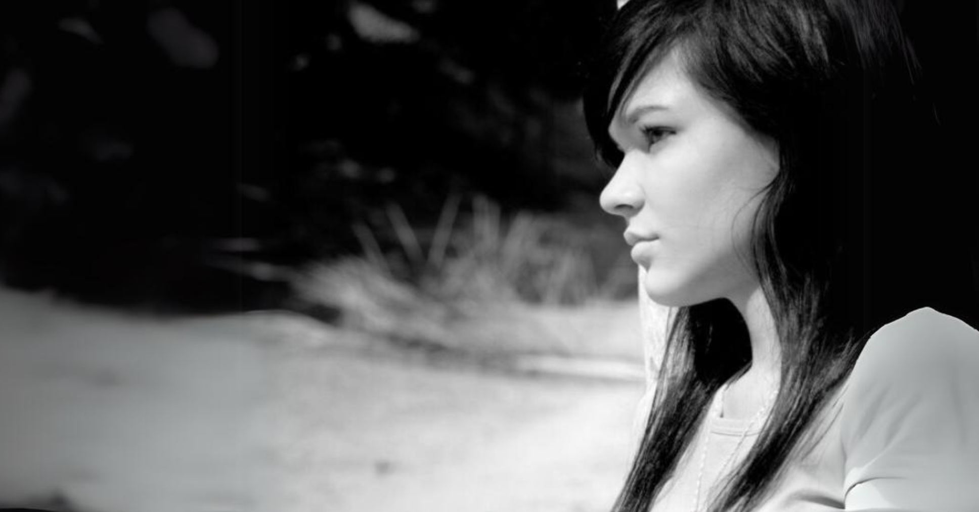 stock image - Girl looking into distance thoughtfully
