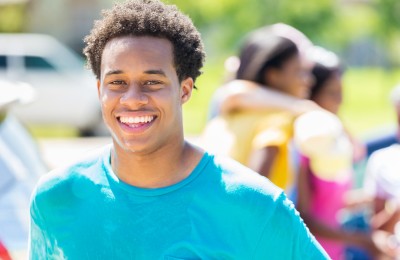 Fundraising volunteer at a car wash community event