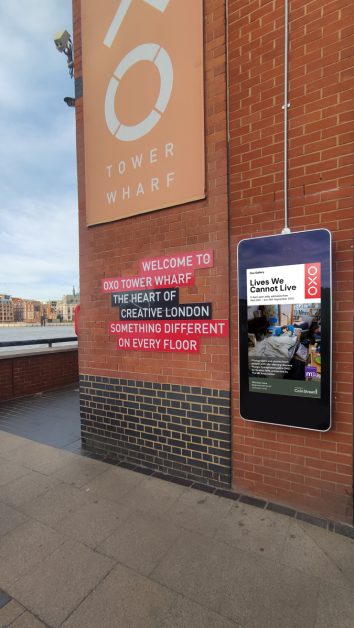 Lives We Cannot Live LED advert screen at the entrance to the Oxo Tower