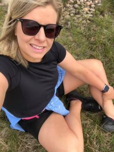 Hailee sat outside on the grass
