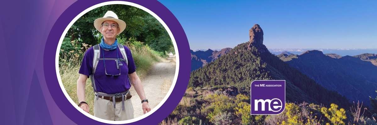 IMAGE DESCRIPTION: A photo of MR Lee out hiking, wearing a sunhat and a purple MEA T-shirt, smiling at the camera. ME Association logo.