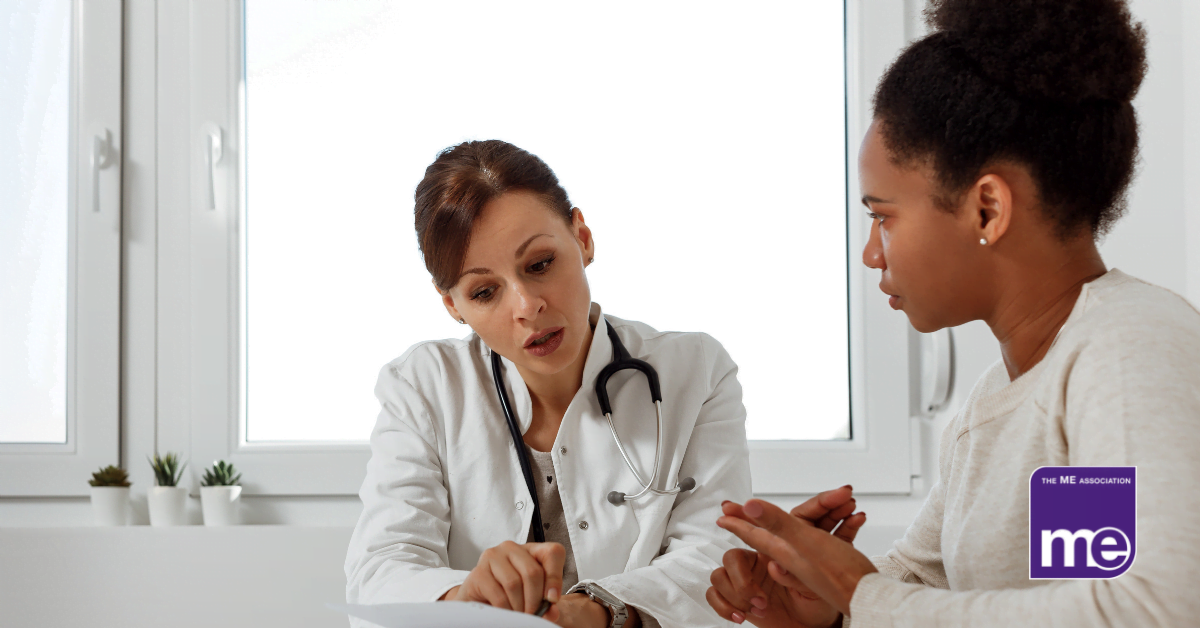 IMAGE DESCRIPTION: A lady doctor speaking with a person of colour about her diagnosis. The ME Association logo (bottom right).