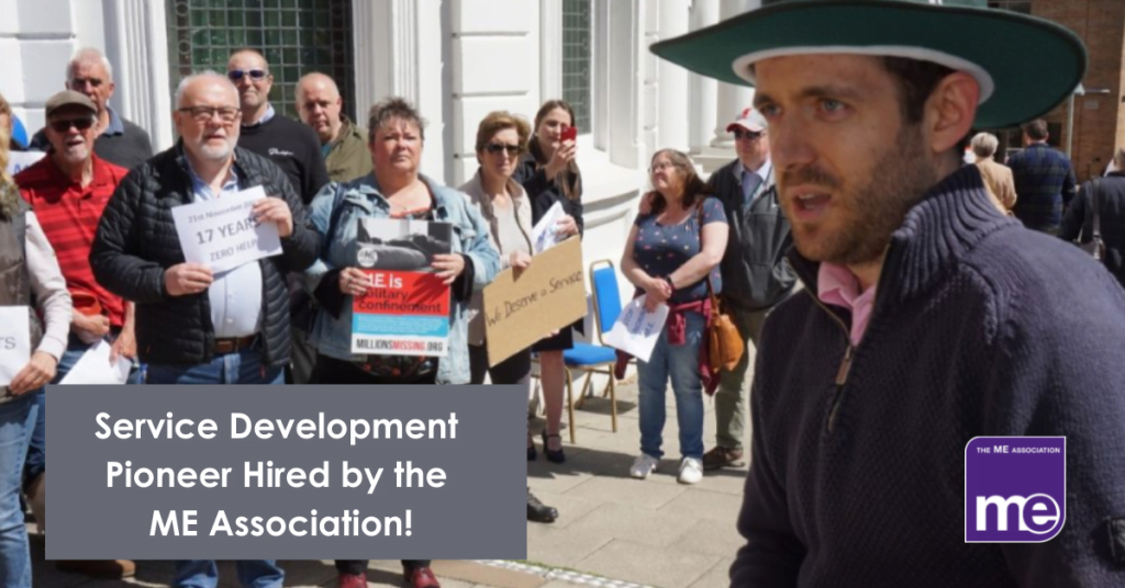 IMAGE DESCRIPTION: A picture of Juan Corlett at an Isle of Man protest to call for services for people with ME/CFS and Long Covid.